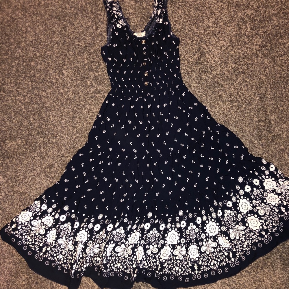 Long dress with floral pattern.